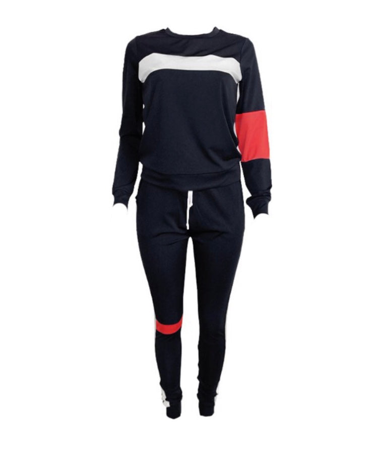 Black and white fitted jogging suit