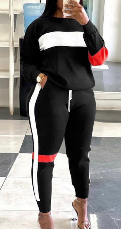 Black and white fitted jogging suit