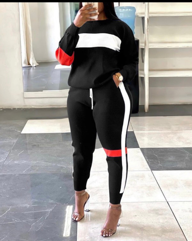 Black and white fitted jogging suit